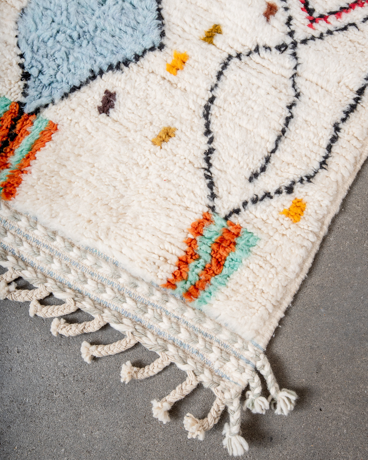 Modern, designer, handcrafted Berber rug from Morocco. Beniourain carpet with beautiful colours and patterns and fluffy wool texture.